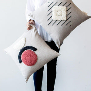 AfriScandi Sunrise Pillow kanju interiors African décor handmade natural organic color accent pillow cushion throw decorative lounge comfortable comfy unique modern contemporary stylish soft accent durable minimal couch chair bed luxury hand made thick plush yarn texture punch needle knitting simplicity original embroidered South Africa quality cotton cream black white tangerine circle half circle