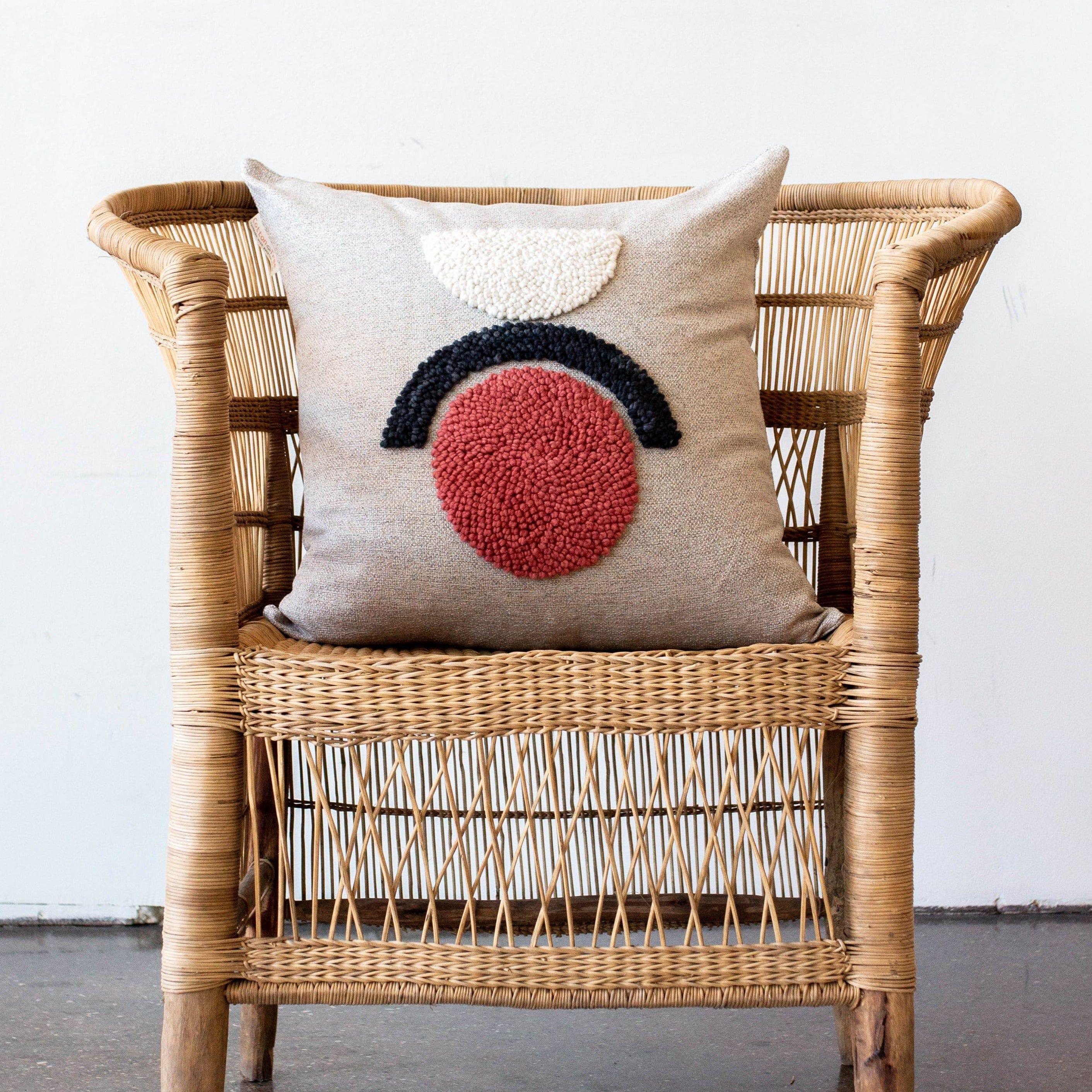 AfriScandi Sunrise Pillow kanju interiors African décor handmade natural organic color accent pillow cushion throw decorative lounge comfortable comfy unique modern contemporary stylish soft accent durable minimal couch chair bed luxury hand made thick plush yarn texture punch needle knitting simplicity original embroidered South Africa quality cotton cream black white tangerine circle half circle 
