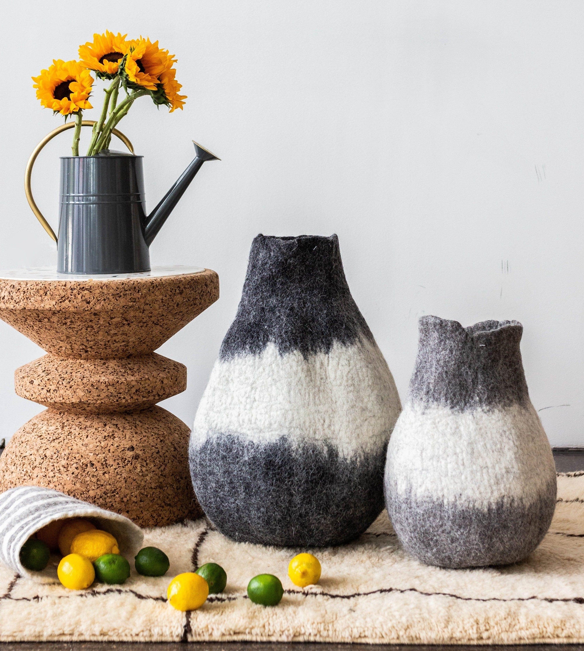 Eclipse Gourd kanju interiors floor table shelf organic unique modern contemporary stylish minimal luxury home goods gift hand felted felt hand dyed karakul wool South Africa functional décor decorative decoration texture soft durable washable collapsible ombre gourd basket small large charcoal gray natural white storage planter