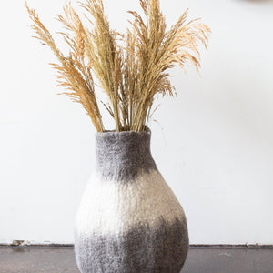 Eclipse Gourd kanju interiors floor table shelf organic unique modern contemporary stylish minimal luxury home goods gift hand felted felt hand dyed karakul wool South Africa functional décor decorative decoration texture soft durable washable collapsible ombre gourd basket small large charcoal gray natural white storage planter