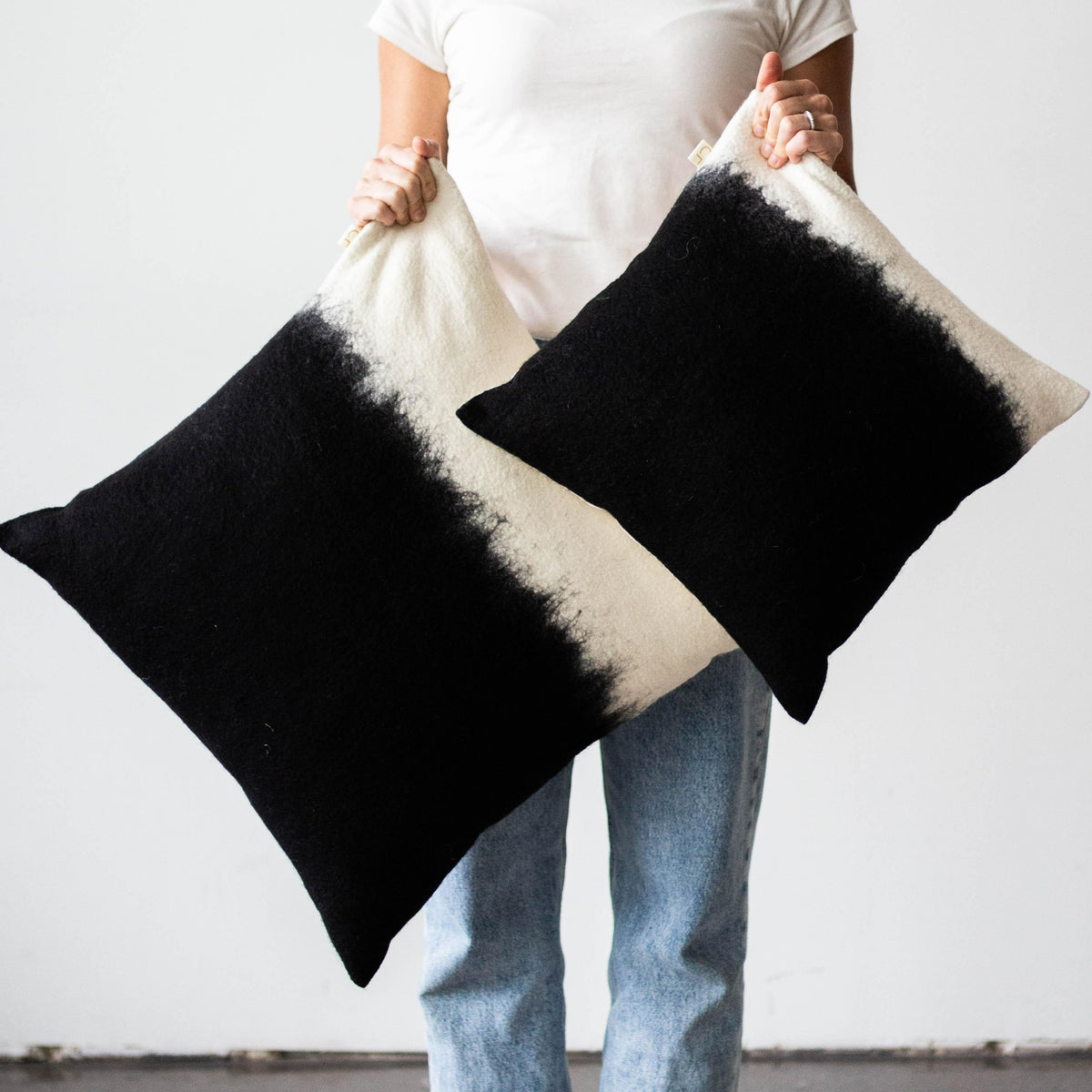 Eclipse Hand Felted Pillow kanju interiors African décor handmade natural organic color accent pillow cushion throw decorative lounge comfortable comfy unique modern contemporary stylish soft accent durable minimal couch chair bed luxury hand made home good gift hand felted felt merino wool mohair yarn hand dyed felting black white