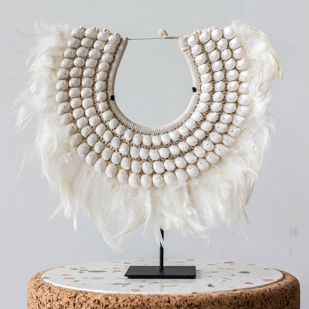 Feathered Shell Statement Necklace kanju interiors African décor mounted handcrafted collar necklace décor decorative decoration shell stand display shelf mantel table unique traditional modern stylish hand made boho accent small medium large statement Cameroon home goods gift white sliced whole shell