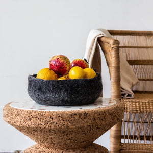 Hand Felted Nesting Bowls kanju interiors organic unique modern contemporary stylish minimal luxury home goods gift hand felted felt hand dyed karakul wool South Africa functional décor decorative decoration texture soft durable washable collapsible  nesting catch all set of three charcoal natural white storage small medium large flower plant succulent home office dining bedroom living room shelf table texture 